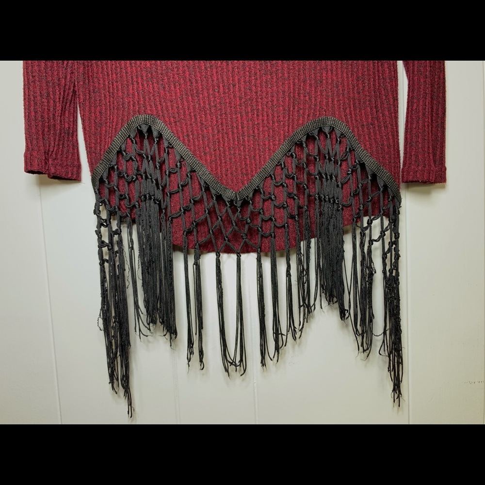 Knitted sweater with dangles at the bottom. - Picture 2 of 6